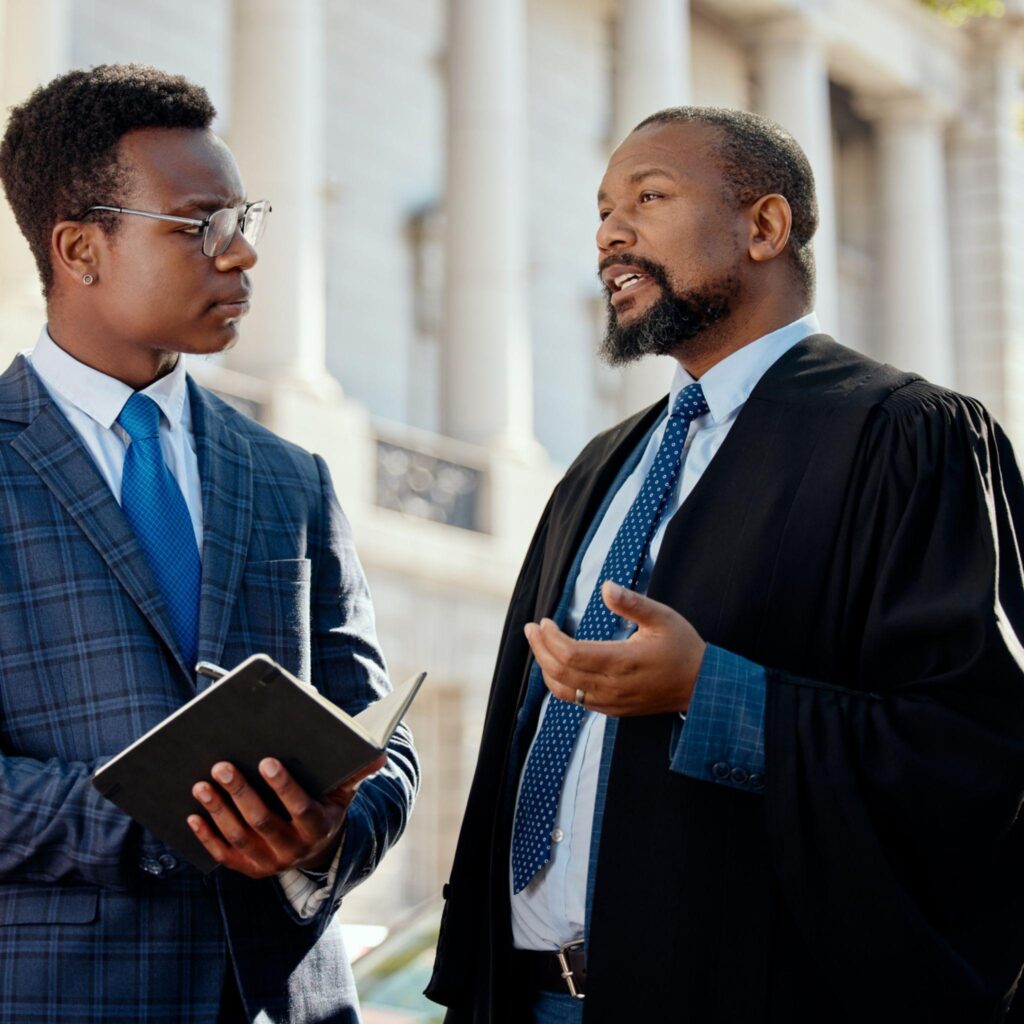 A lawyer explaining to a business owner what business structure is all about.